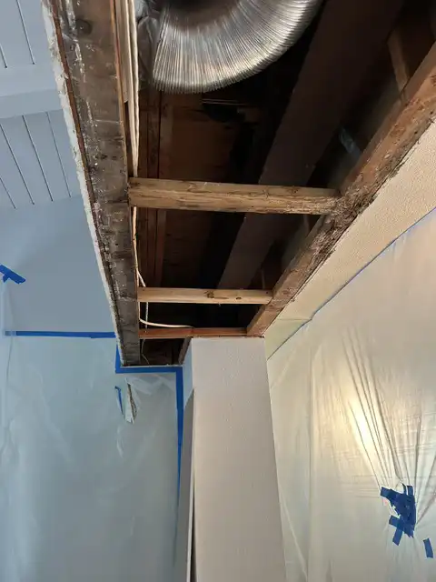 Small soffit water damage repair. Finish items protection, Demolition, drywall hanging, taping, corners application, matching existing texture and clean up. 2026 project photo